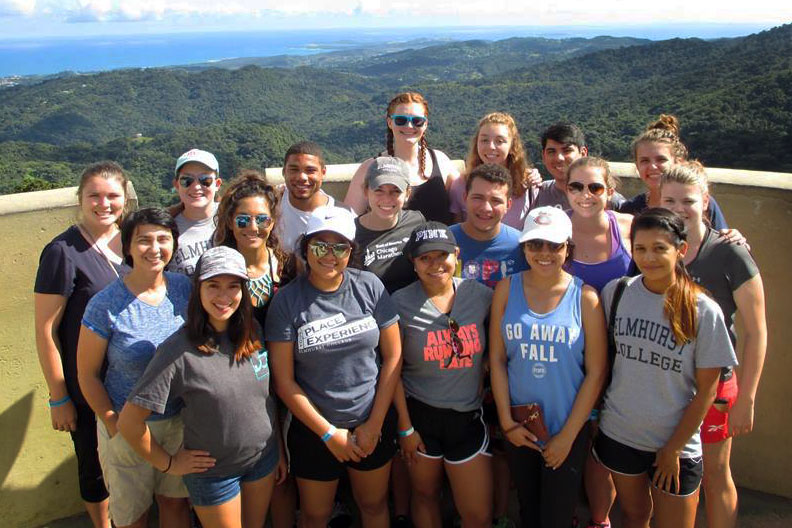 Elmhurst University students posing at a scenic locale during a study abroad trip for our undergraduate programs