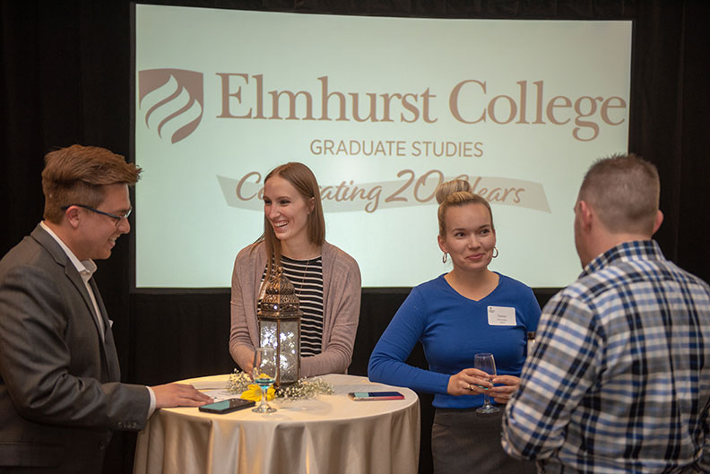 Students, alumni and friends gathered for a 20th anniversary celebration of Elmhurst College's graduate studies May 11, 2019.