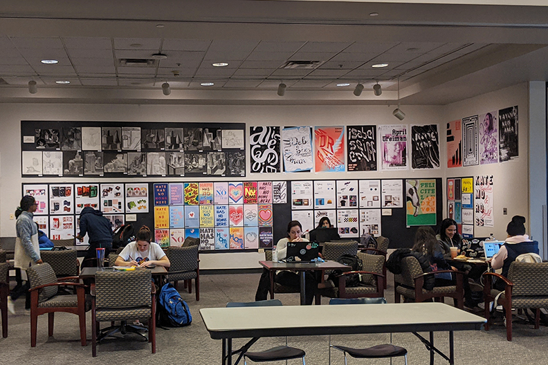 Artwork covers a wall of the Frick Center on the Elmhurst University campus.