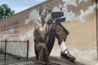 A mural painting of photographer Dorothea Lange by artist and Elmhurst College faculty member Rafael Blanco.