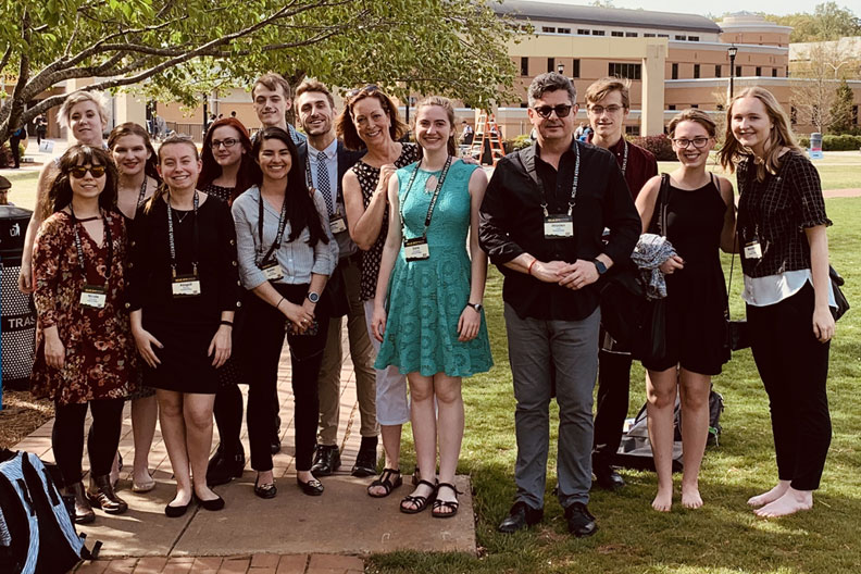 Elmhurst University students and professors pose in a group photo at the 2019 NCUR conference.