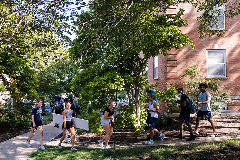 Elmhurst University students and their families help with the move-in effort during New Student Orientation on campus.