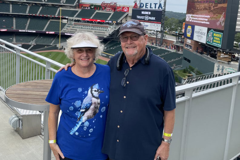 Elmhurst University alumni at a baseball game in Atlanta for the 2021 President's Road Trip.