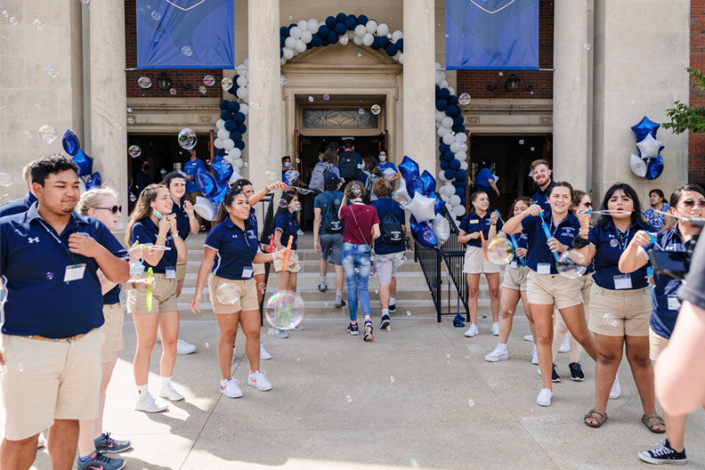 Elmhurst University student leaders welcome new students into Hammerschmidt Memorial Chapel during Orientation in 2021.