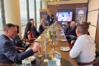 Elmhurst University alumni gather at a dinner table for the 2021 President's Road Trip event in Detroit, MI.