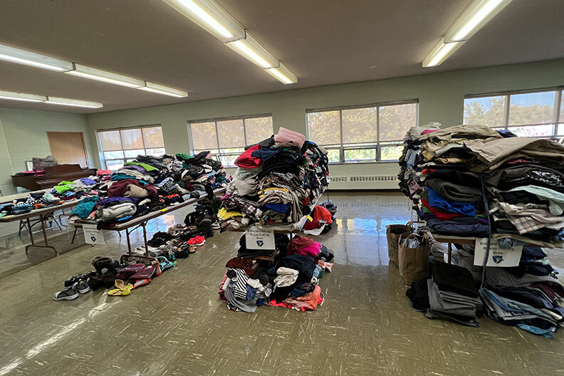 Piles of clothes that were donated at the Bluejay Clothing Drive in October.