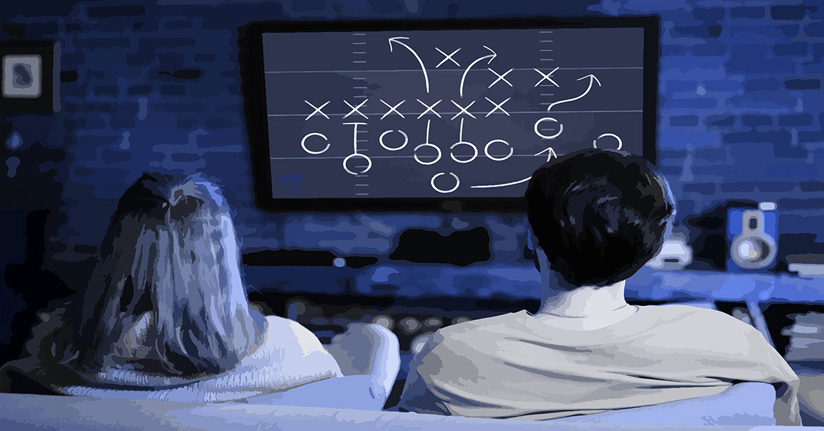 A couple watches a TV with a football play diagram to illustrate NCAA football TV ratings.