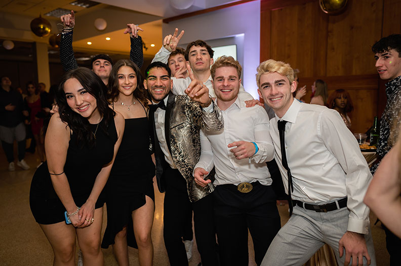 A group of Elmhurst University students pose for a photo during the 2022 Presidents' Ball event in Elmhurst, IL.