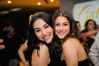 Two female Elmhurst University students pose for a photo during the 2022 Presidents' Ball event in Elmhurst, IL.