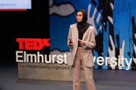 Shahnaaz Sakkaria speaks onstage during the inaugural TedxElmhurstUniversity event.