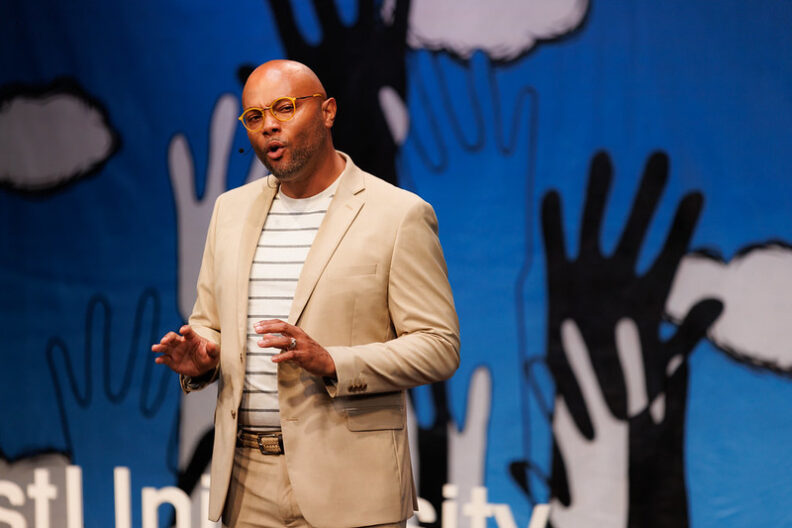 Earl Fields speaks onstage during the inaugural TedxElmhurstUniversity event.