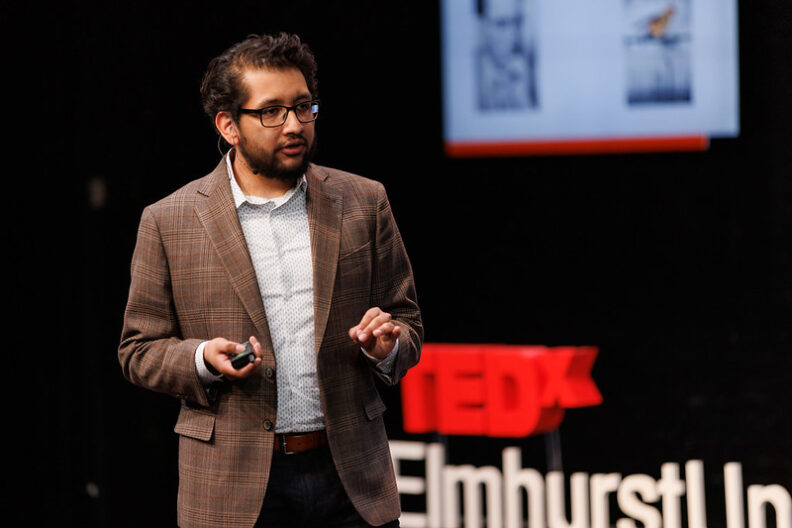 Edgar Palomino speaks onstage during the inaugural TedxElmhurstUniversity event.