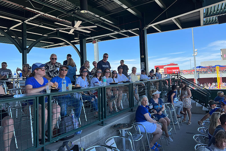 A group of Elmhurst University alumni at the Mesa, AZ, President's Road Trip spring training baseball event.