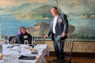 President Troy D. VanAken speaks with a group of Elmhurst University alumni during the 2022 President's Road Trip event in Minneapolis, MN.