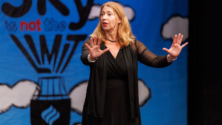Lori K. Tompos speaks onstage during the inaugural TedxElmhurstUniversity event.