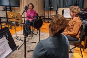 Beatriz Gomez-Acuna, left, Melissa Newhouse and Mary Kay Mulvaney record an episode of the Elmhurst University podcast "Calling All Voices."