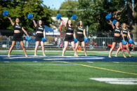 Dancers on the Elmhurst University Poms Team during a performance at the 2022 Homecoming football game.