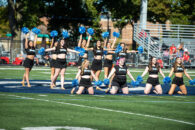 Dancers on the Elmhurst University Poms Team during a performance at the 2022 Homecoming football game.