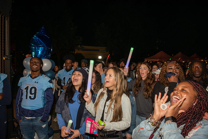 Elmhurst University students celebrate at the concert and pep rally during Homecoming weekend of 2022.