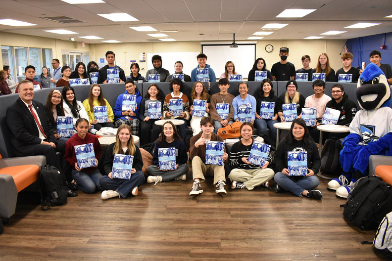 A large group of Fenton High School students who were accepted to Elmhurst University posing in a group photo.