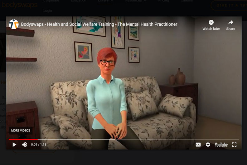 A screen shot of a woman sitting on a couch in a training video from Bodyswaps. Bodyswaps is a soft-skills training startup that awarded a grant to Elmhurst University in conjunction with Meta.