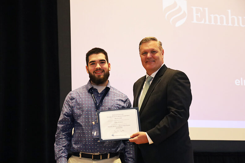 Two men holding a certificate