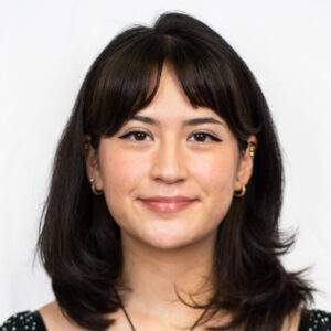 Headshot of Alejandra Galvan in front of a blank background
