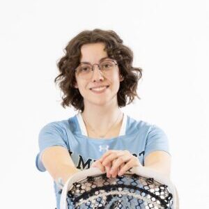 Headshot of Jacquelin Vanoni in front of a blank background