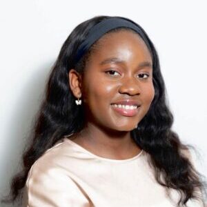 Headshot of Netochukwu Kalu in front of a blank background